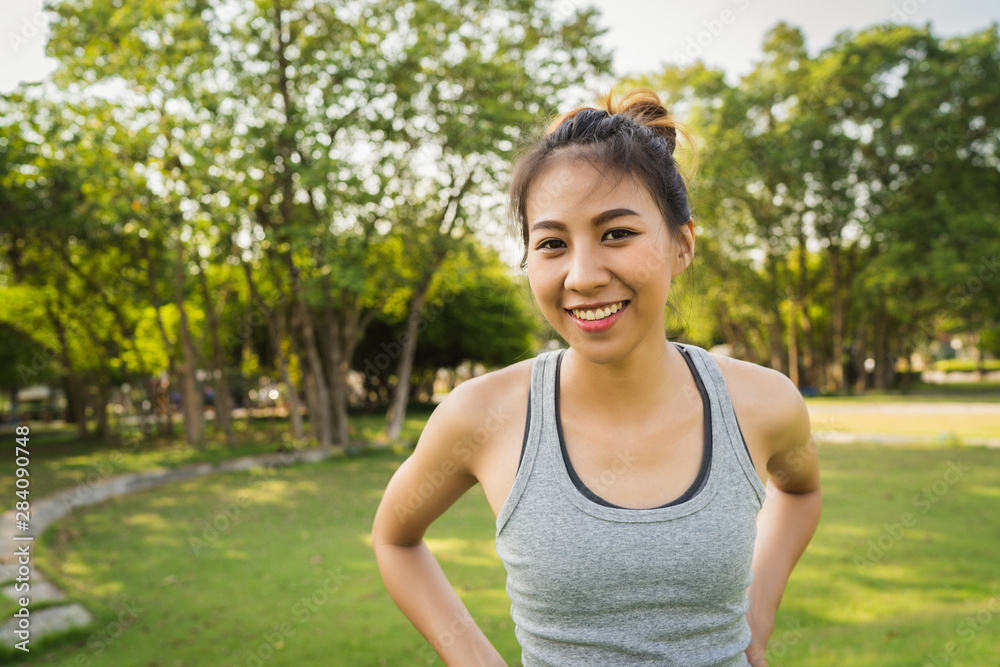 Young asian woman yoga outdoors keep calm and meditates while practicing yoga to explore the inner peace. Yoga have good benefits for health near lake at park. Sport and Healthy lifestyle concept. Young asian woman yoga outdoors keep calm and meditates while practicing yoga to explore the inner peace. Yoga have good benefits for health near lake at park. Sport and Healthy lifestyle concept.