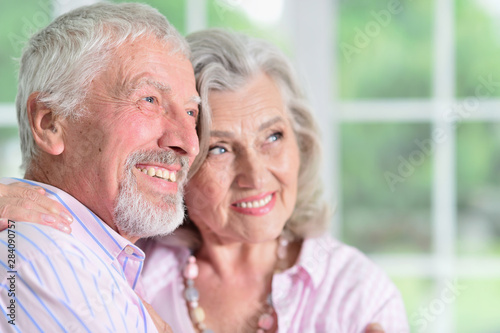 portrait of happy senior couple at home
