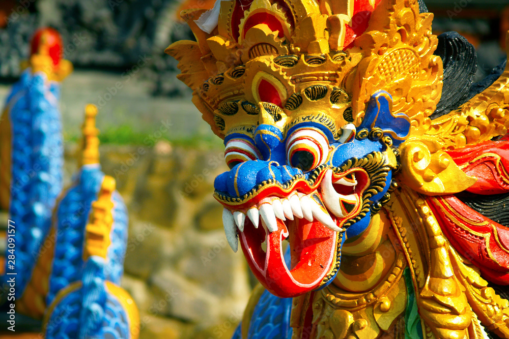 Stone carved statue of Barong in hindu temple in Bali-Indonesia