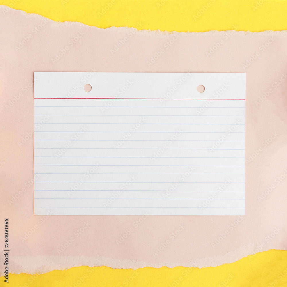 Line paper textured on beige card paper over yellow background Line paper textured on beige card paper over yellow background