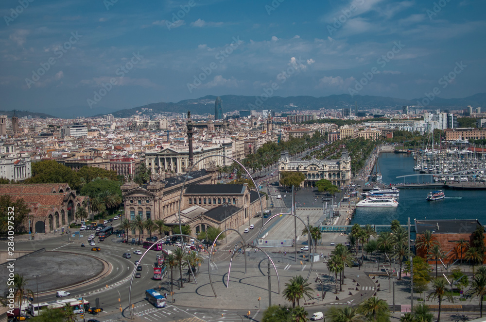 .BARCELONA, SPAIN - SEPTEMBER 9, 2014: Aerial view of Barcelona, Maritime Museum, from the cableway to the Montjuic hill with the Barceloneta beach and Port Vell. Catalonia, Spain, Europe