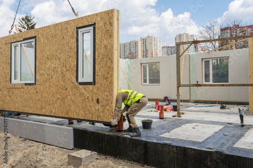 Fototapet Construction of new and modern modular house