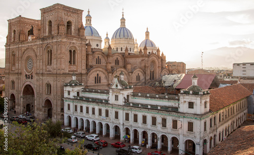 Overview of New Cathedral, showing entire street block, in Cuenca, Ecuador photo