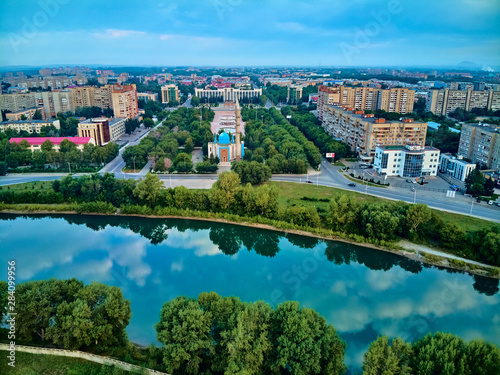 UST-KAMENOGORSK, KAZAKHSTAN (QAZAQSTAN) - August 08, 2019: Beautiful panoramic aerial drone view to Central City Mosque in Oskemen