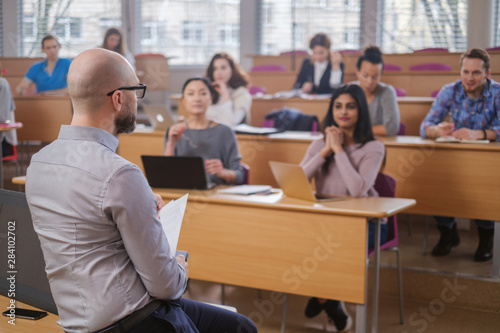 Multinational group of students in an auditorium