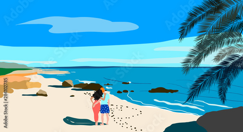 Seafront view on long sand beach with stones