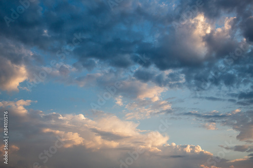 Natural background with sky and clouds. Dramatic sky with clouds. Dark sky with Cumulus clouds. © Flower_Garden