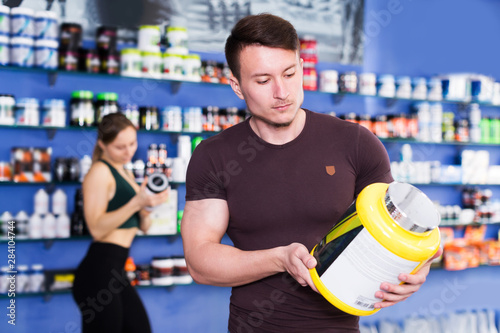guy looking for necessary food supplements