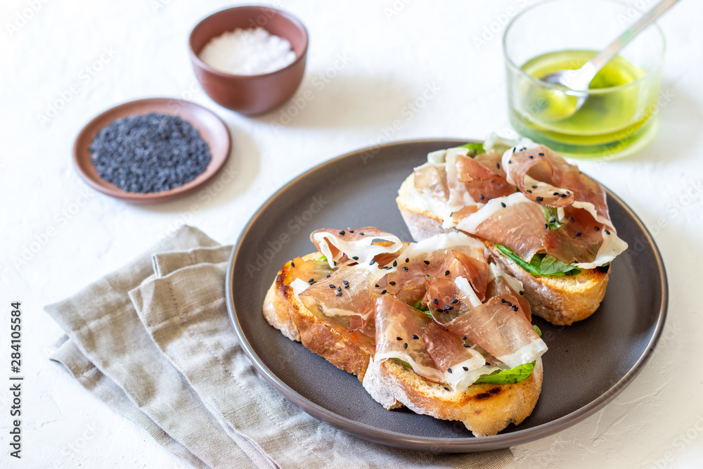 Bruschetta with prosciutto . Italian cuisine. National food. Bruschetta with prosciutto . Italian cuisine. National food.