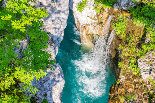 Waterfall to rriver Soca, Velika korita Soce, Triglavski national park, Slovenia photo