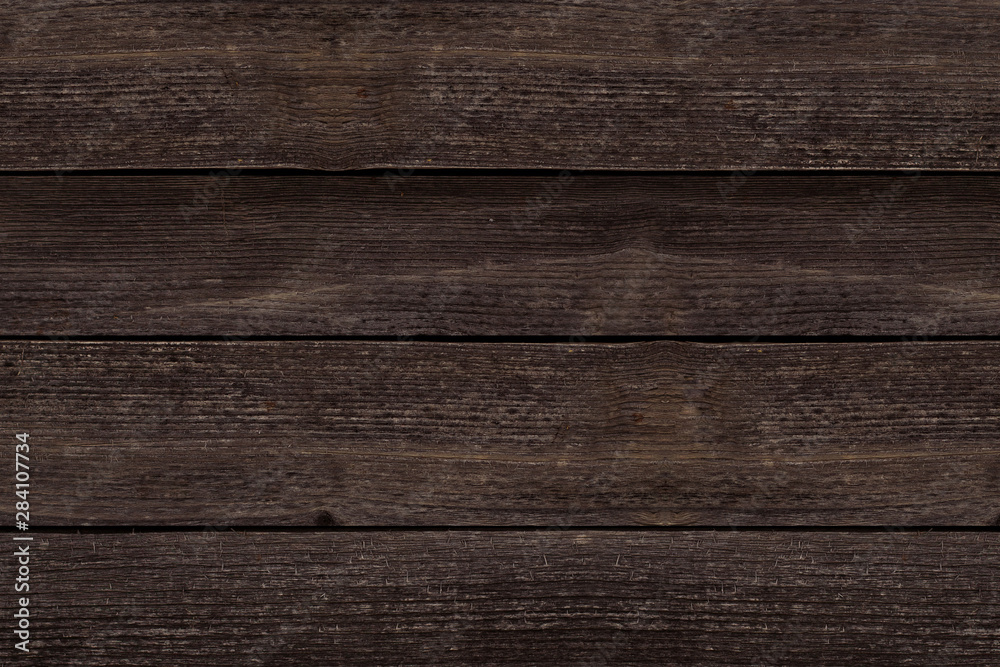 Dark brown wood texture for background. Wooden boards texture. Stock