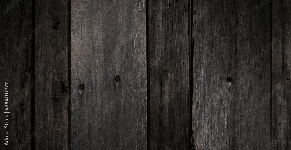 Dark wood texture for background. Wooden boards texture.	