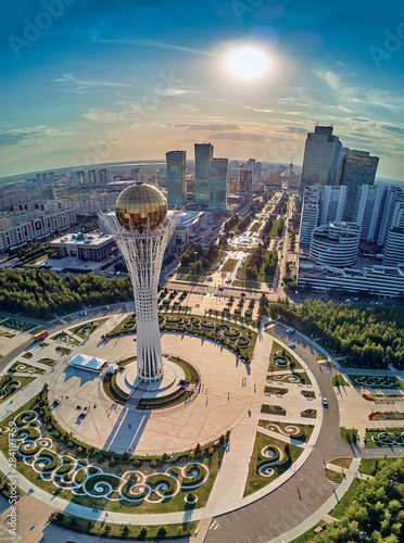 Obraz na płótnie NUR-SULTAN, KAZAKHSTAN (QAZAQSTAN) - August 11, 2019: Beautiful panoramic aerial drone view to Nursultan (Astana) city center with skyscrapers and Baiterek Tower - symbol of Kazakh people freedom w salonie