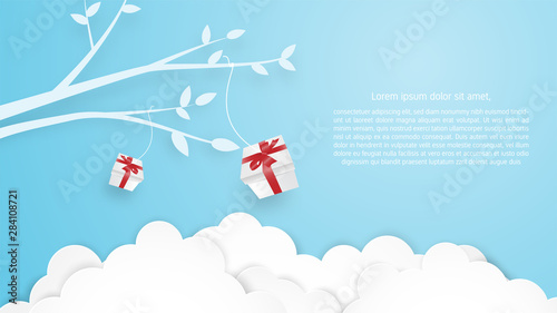 Birthday, Christmas, Greeting card, Celebration concept background in paper cut style. Paper craft gift box hanging on tree branches in the sky and cloudscape. backdrop, wallpaper, poster, banner. © indysystem