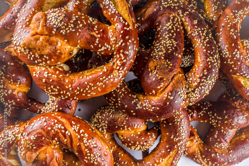 Many pretzels on a white background Many pretzels on a white background