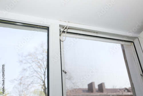 Mosquito net on the window. Protection from bugs.