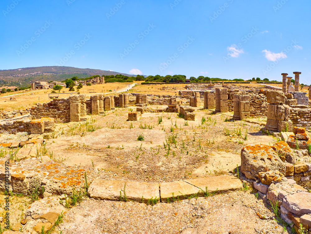 Remains of the Macellum, the market of Baelo Claudia. View from Decumanus Maximus street. Baelo Claudia Archaeological Site. Tarifa, Cadiz. Andalusia, Spain.