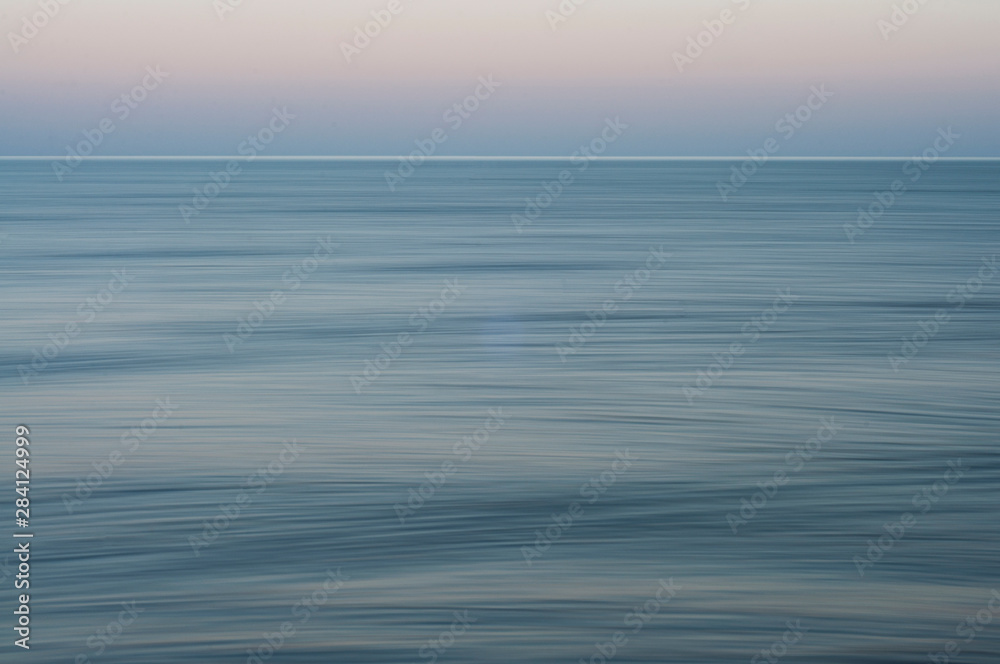 Obraz premium Sunset over the sea. Summer time. Summer sea relax. Ocean blue.