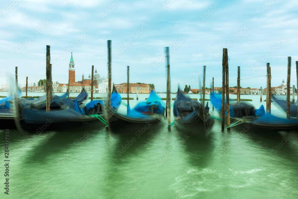 Fototapeta premium Gondolas floating in Grand Canal, Venice, Italy