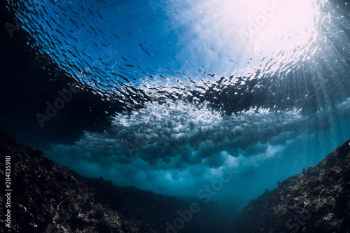 Breaking wave in underwater. Ocean element in underwater