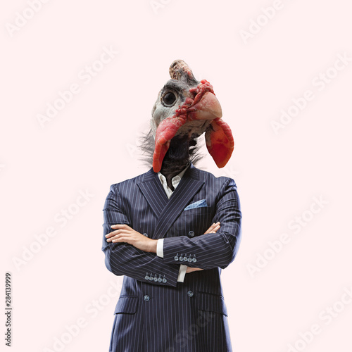 Look like a boss. Office worker. Male body in suit headed by gobbler. Negative space to insert your text. Modern design. Contemporary art collage. Concept of human nature, thirst for power. photo