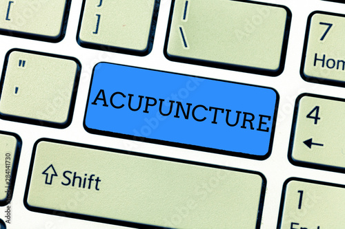 Handwriting text writing Acupuncture. Concept meaning Alternative therapy Treatment for pain and illness using needle.