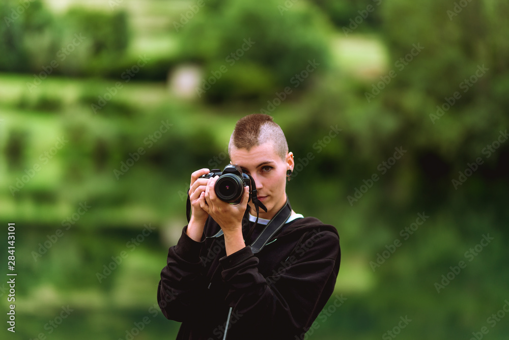 young photographer taking photos young photographer taking photos