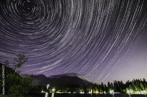 Night startrails with mountains photo