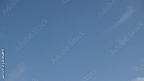Video timelapse white clouds and Moving in the blue sky. 4k time lapse beautiful blue sky with clouds background.