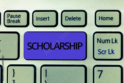 Handwriting text Scholarship. Concept meaning Grant or Payment made to support education Academic Study. photo