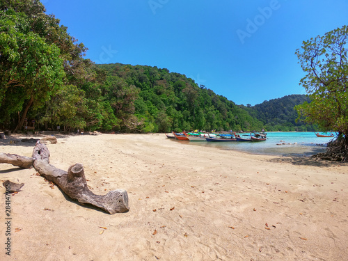 tour boats waiting tourism at mai ngam beach mu ko surin national park attraction chumphon province in thailand