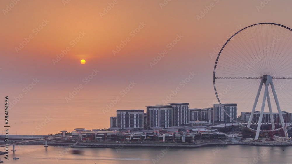 Sunset over Bluewaters Island in Dubai aerial timelapse.