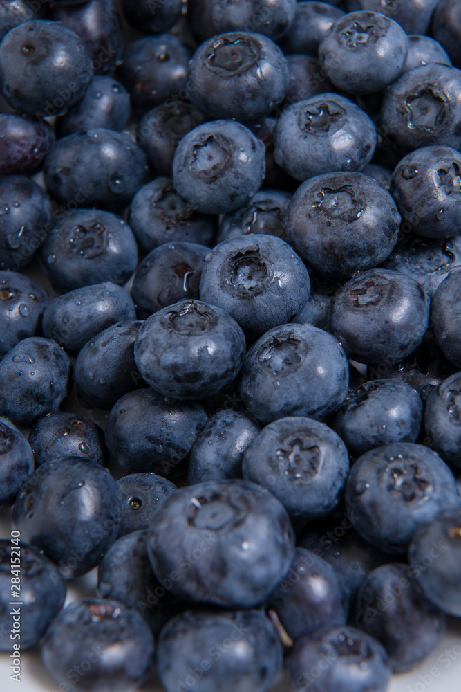 Clean freshly picked blueberries - close up studio shot. ( Ingredients: Antioxidants , Vitamin C, Antioxidant) Clean freshly picked blueberries - close up studio shot. ( Ingredients: Antioxidants , Vitamin C, Antioxidant)