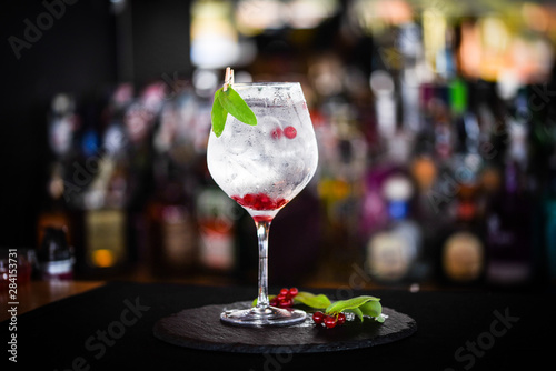 tonic gin with fresh red berries 