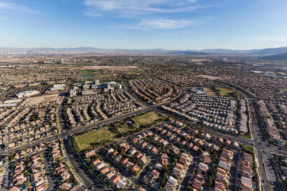 Aerial view of the suburban streets and rooftops in the Summerlin neighborhood of Las Vegas, Nevada.