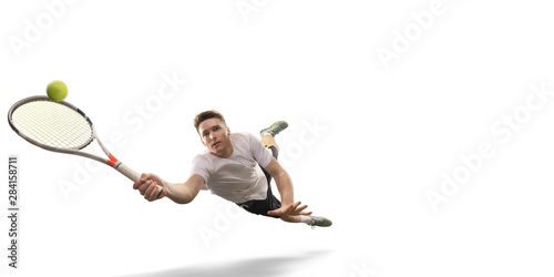 Isolated Male athlete plays tennis on white background