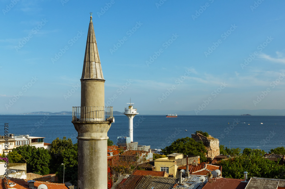 Obraz premium Istanbul landscape view from Sultan Ahmet through minaret and lighthouse on Marmara sea