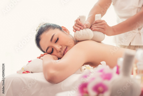 Spa and massage concept, Asian beautiful woman Relaxing massage spa treatment