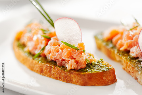 Fototapeta Naklejka Na Ścianę i Meble -  Italian Appetizer Bruschetta with Salmon