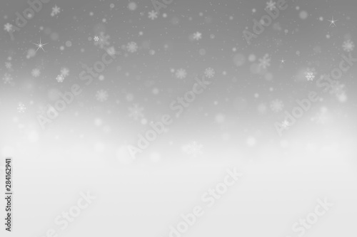 snow background with Snowflakes and snowfall on a cold winter background