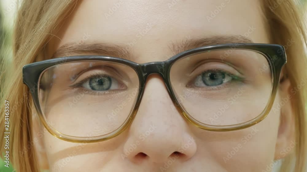 girl's eyes in glasses close-up. girl's eyes in glasses close-up.
