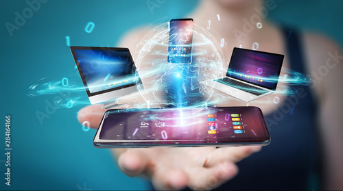 Modern devices connected in businesswoman hand 3D rendering