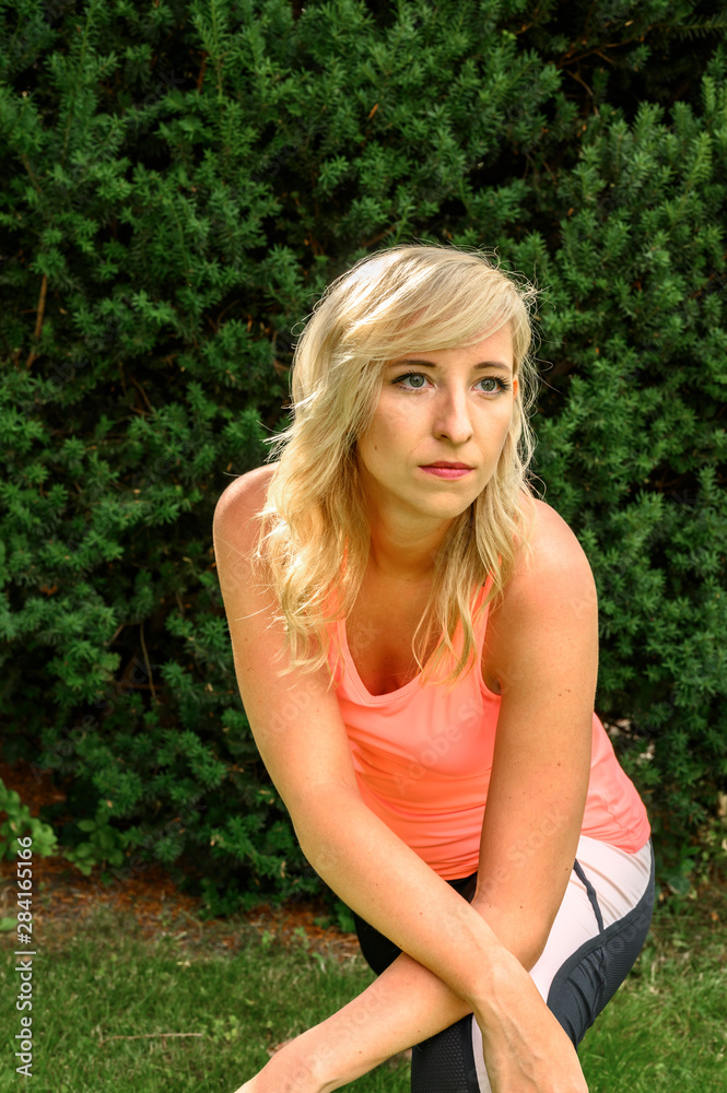 Young woman who practises yoga in nature. Young woman who practises yoga in nature.
