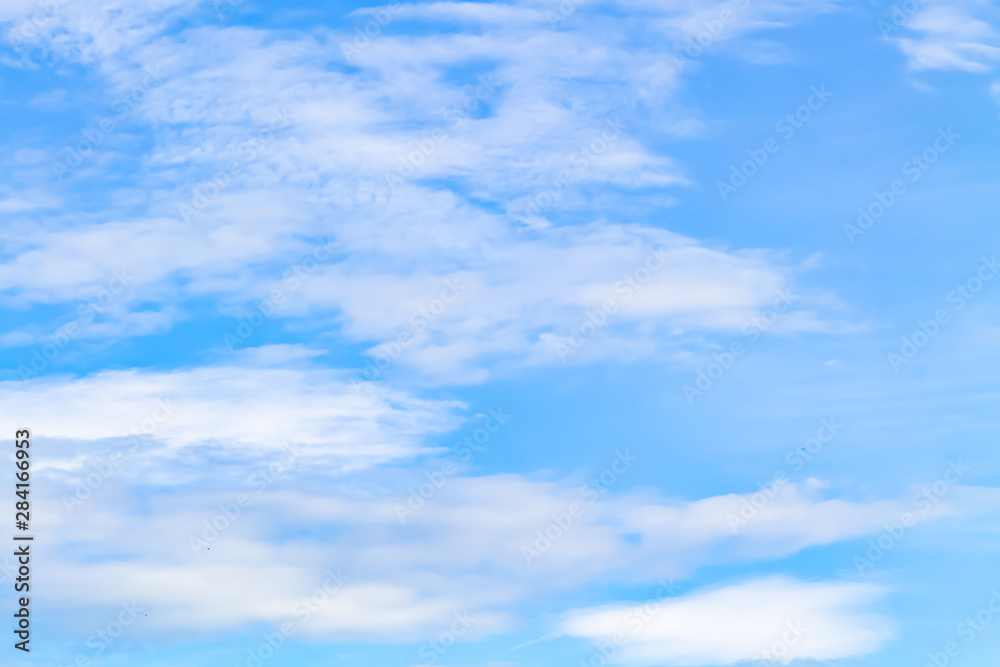 White and lush clouds in the blue sky