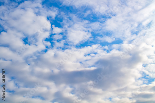 White and lush clouds in the blue sky