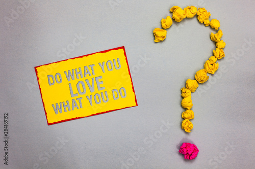 Writing note showing Do What You Love What You Do. Business photo showcasing Make things that motivate yourself Passion Red bordered yellow sticky note yellow paper lumps form question mark