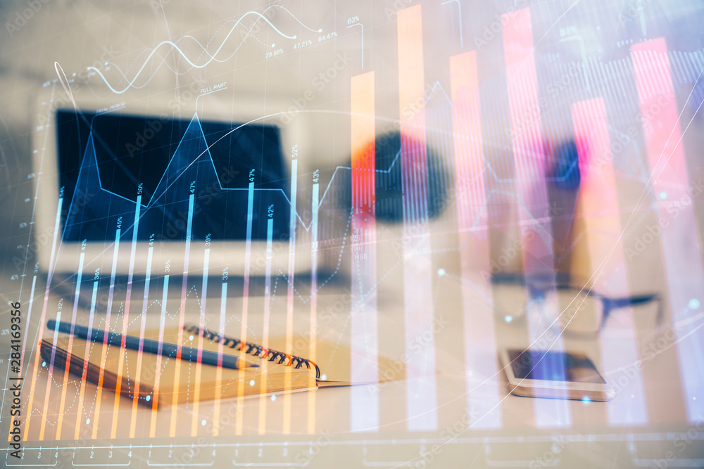 Forex Chart hologram on table with computer background. Double exposure. Concept of financial markets.