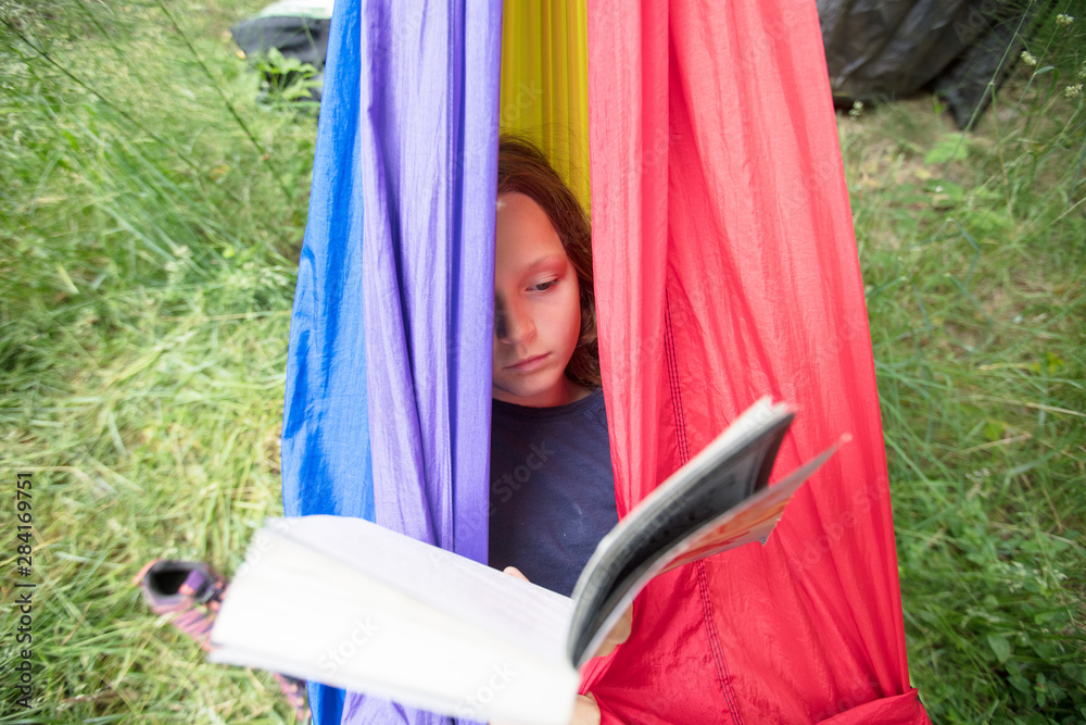 Girl in rainbow hammock Girl in rainbow hammock
