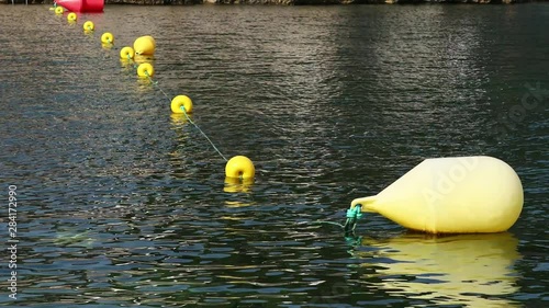 yellow buoy on the water