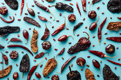 Background of arranged dried?peppers photo